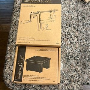 The Pampered Chef apple peeler/corer/slicer & sliced stand. Brand new.